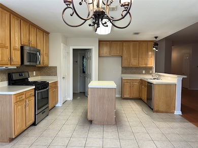 Modern kitchen view from the cozy breakfast room,