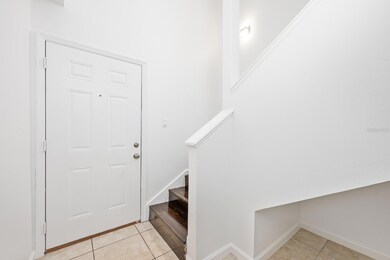 Enter through your private entrance and head up the beautiful WOOD STAIRCASE to the main living level—where you’ll find NO NEIGHBORS ABOVE and a welcoming space that feels both open and airy.