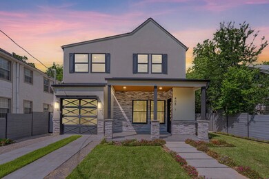 Contemporary house featuring fence, covered porch