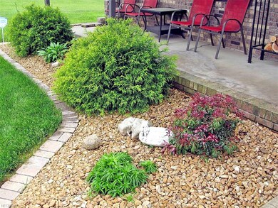 New landscaping adorns the front of the property