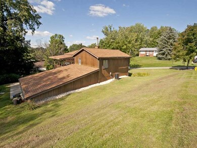 Exterior Back. Side of the House and the Garage an