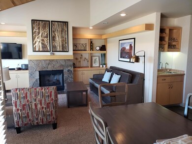 great room with built in and bar