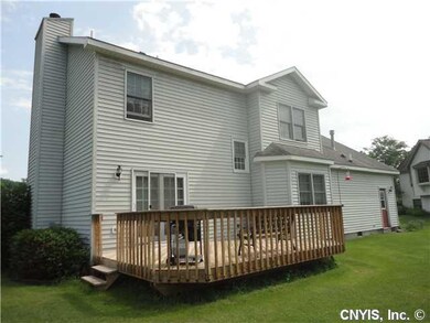 Exterior Back Large deck overlooks yard & brook
