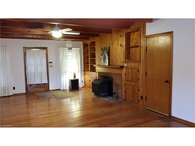 Curtains are hiding the charming front Dutch door.