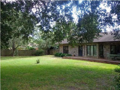 HUGE BACKYARD WITH MATURE LANDSCAPING.