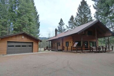 Log Home and Garage