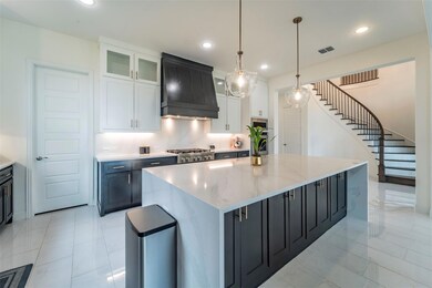 Kitchen with decorative light fixtures, a kitchen 