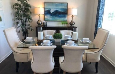 Front flex room used as formal dining.  Picture of the model