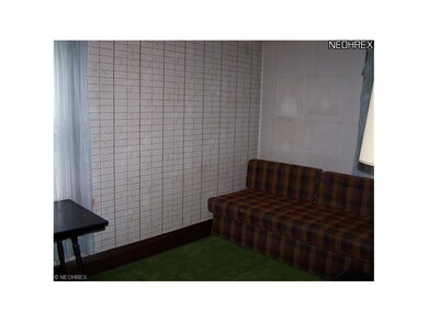 This bedroom is being used as a sitting room.