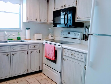 kitchen showing stove and refrig