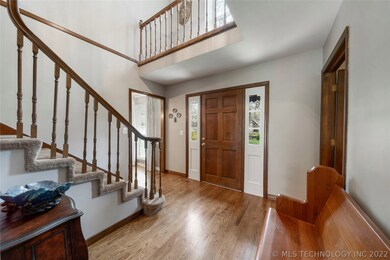 Warm and welcome entry with beautiful hardwood flo