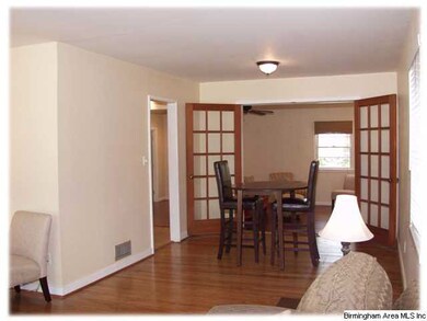 The dining area from the living.  The kitchen is o