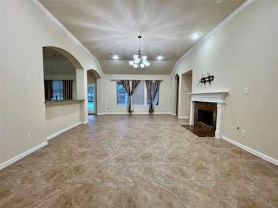 This spacious living area features tiled floors, a