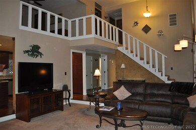 Going up the stairs is the loft/office, 2 more ver