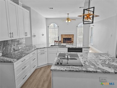 Kitchen opens to family room.