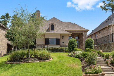 Curb appeal with beautiful landscaping & cascading stairs.