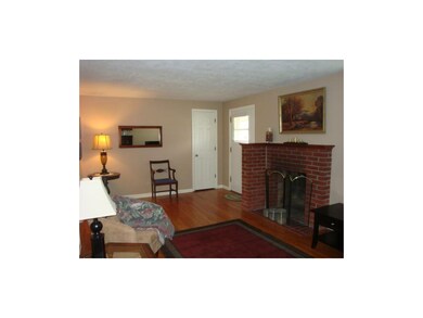 Living room with fireplace.