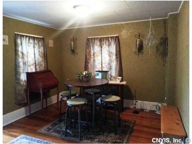 Dining Room. Enter through an enclosed porch to a 