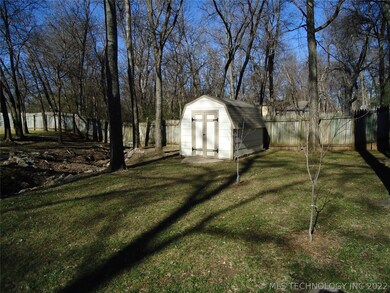 Handy shed leaves plenty of room in garage.