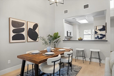Dining space featuring light wood-type flooring, 