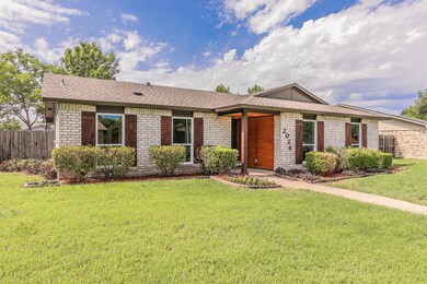 Single story home featuring a front yard