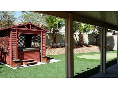 Exterior Back. gazebo with hot tub