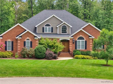 View of front of property with a front lawn