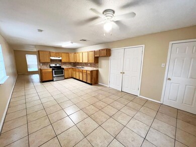 Another view of the breakfast area and kitchen tak