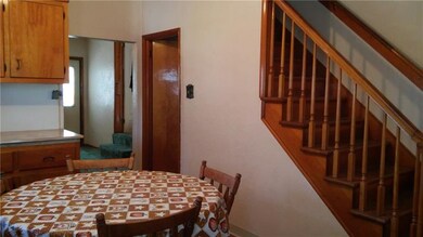 Big Dining Room With Floor To Ceiling Cupboards