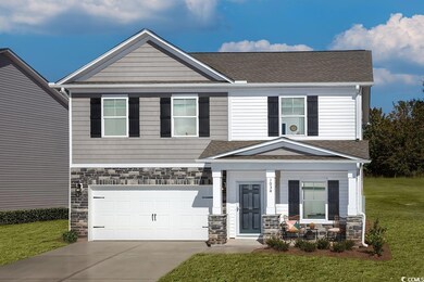 Craftsman inspired home featuring a front yard and