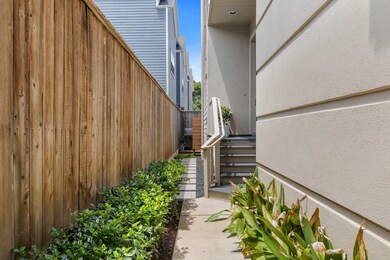 Upon entry through a private front gate beyond the beautifully designed landscaping, you'll immediately be impressed by elegant wood floors & soaring ceilings, accentuating the expansive nature of this home’s remarkable interiors.
