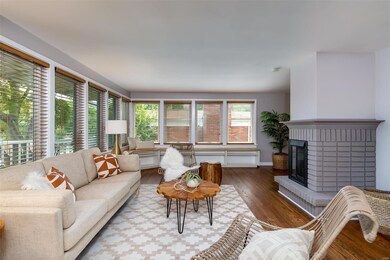 Unique corner windows & fireplace that add to the 