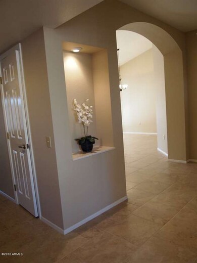 Foyer with lighted art niche
