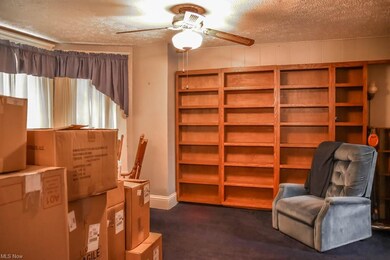 Dining room with a bayed wall.