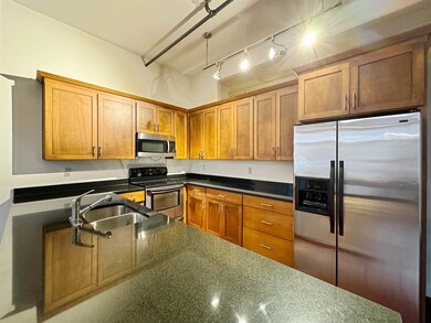 Kitchen featuring appliances with stainless steel 
