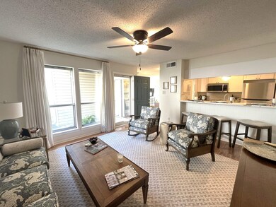 Pretty LR lots of light opens to kitchen and dining room