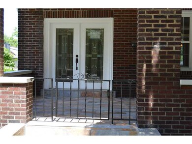 Exterior Front. New double front door and tiled fr