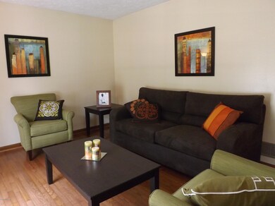 LIVING ROOM WITH HARDWOOD FLOORING