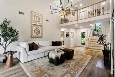 View of the living room to the entrance and up to