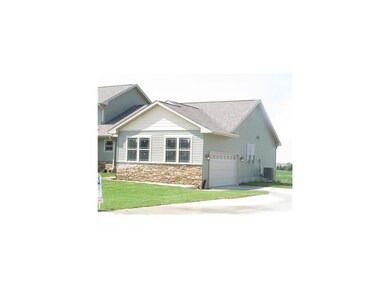 Front Exterior. end load 2 car garage
