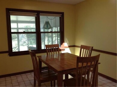 Breakfast room with vaulted ceiling