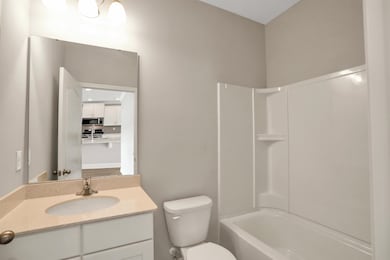 Full bathroom with vanity and tub / shower combination