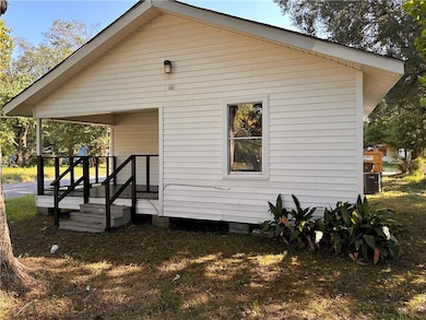 View of home's exterior featuring a lawn