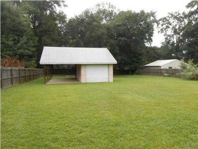 ADDITIONAL GARAGE AND CARPORT