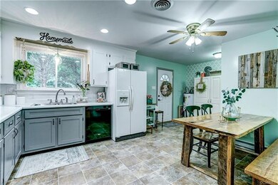 Another View of Kitchen Showing Door to Back Glass