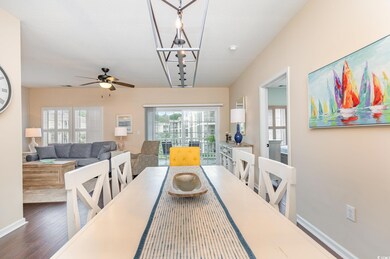Dining area featuring ceiling fan, plenty of natur