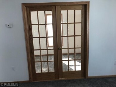 French doors leading into office/bedroom
