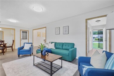 Living room featuring wood finished floors