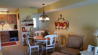 Open to kitchen and living area