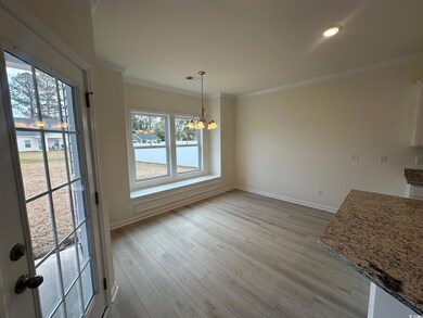 Unfurnished dining area featuring visible vents, b